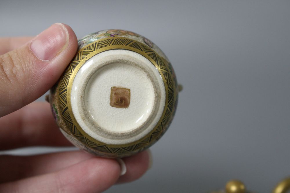 A Satsuma miniature teapot and matching sugar bowl, decorated with geisha in gardens, teapot length 7.5cm height 4.5cm